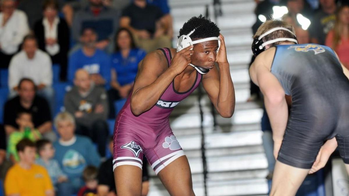 Chris Clayton gave Rock Hill a huge momentum boost in Wednesday’s 5A Upper State championship wrestling match with a decision win. He and the Bearcats go for the school’s 19th wrestling state title on Saturday.