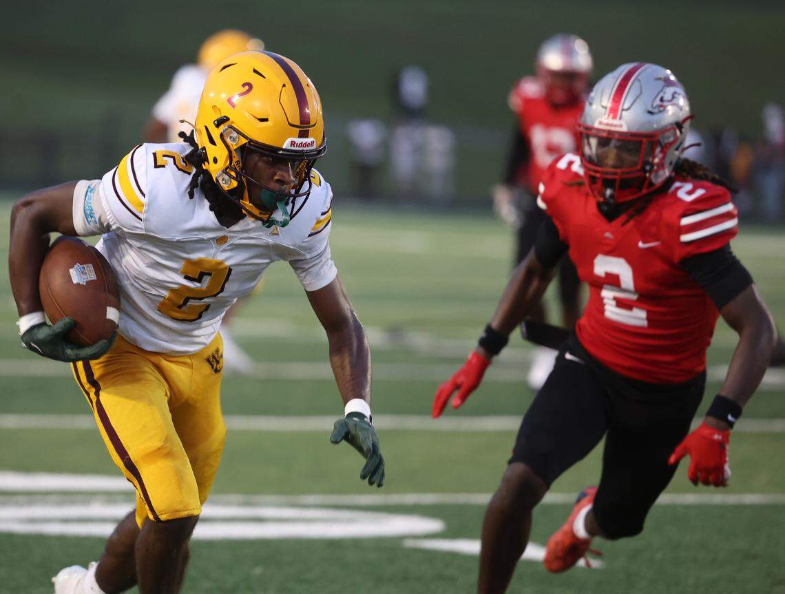 West Charlotte's Donte Nicholson carries the ball against South Pointe's C.J. Wherry Friday, Sept. 5, 2025 in Rock Hill, S.C.