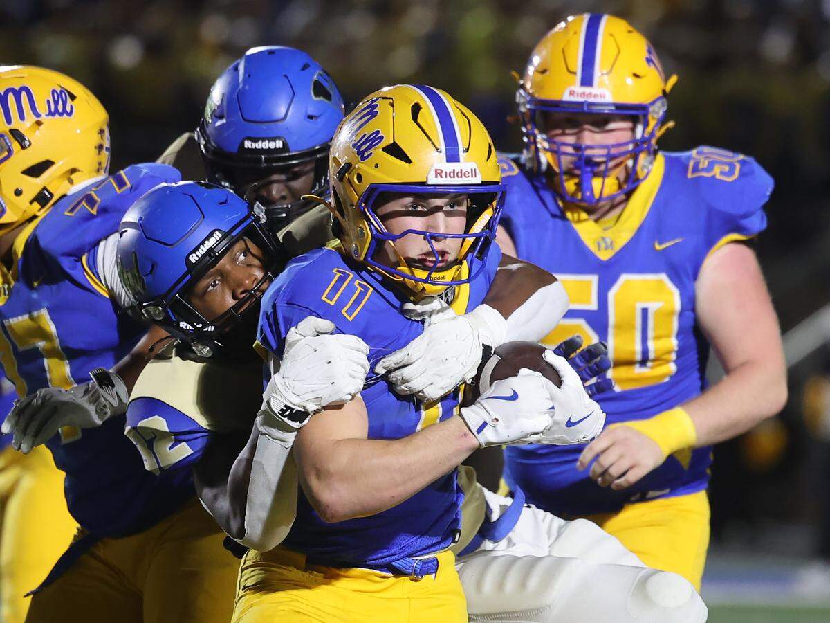 Indian Land's Michael Foster pulls down Fort Mill's Broden Mitcheson on Friday in Fort Mill. 