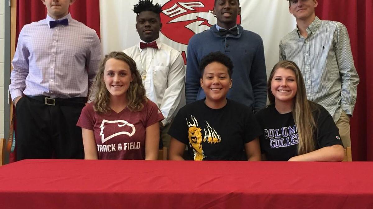 (Back to front, left to right) Paden Lipe, Greg Ruff, Quay Brown, Wyatt Reid, Olivia Paxton, Izzy Clark, and Jamie Rankin signed NLIs on Wednesday at South Pointe.