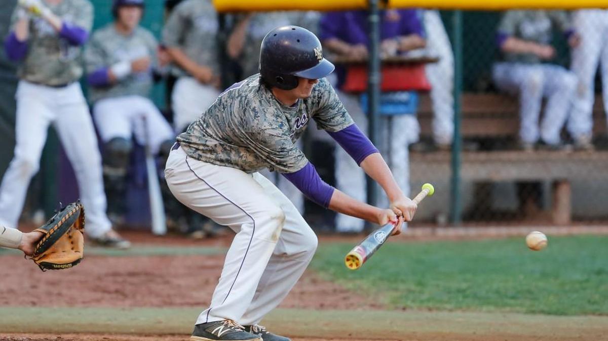 Northwestern’s Will Hagood lays down a sacrifice bunt to advance the runner in Monday’s victory.