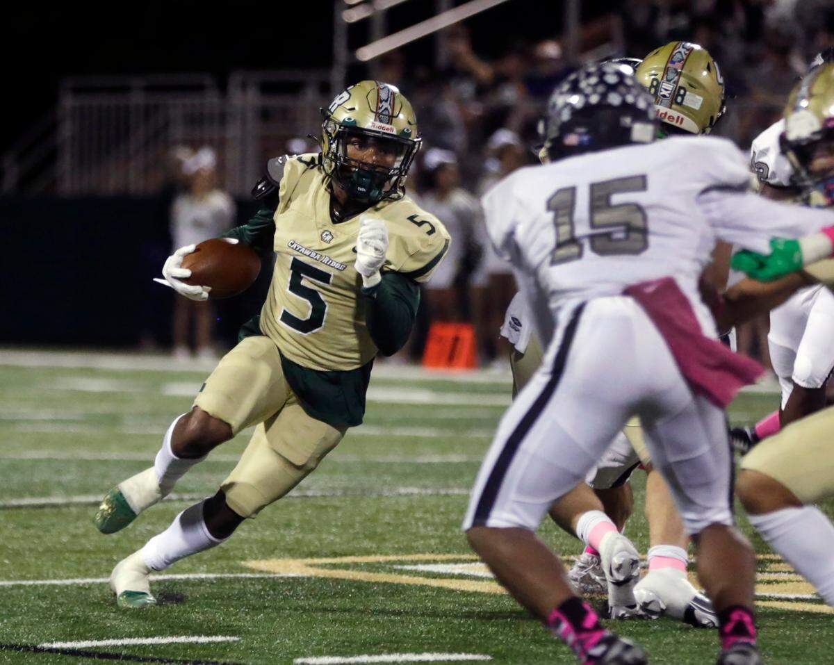 Catawba Ridge’s Ira Mister carries the ball during the Copperheads’ varsity football game against the York Comprehensive Cougars in Fort Mill, S.C. on Friday, Oct. 7, 2022.