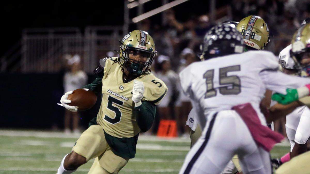 Catawba Ridge’s Ira Mister carries the ball during the Copperheads’ varsity football game against the York Comprehensive Cougars in Fort Mill, S.C. on Friday, Oct. 7, 2022.
