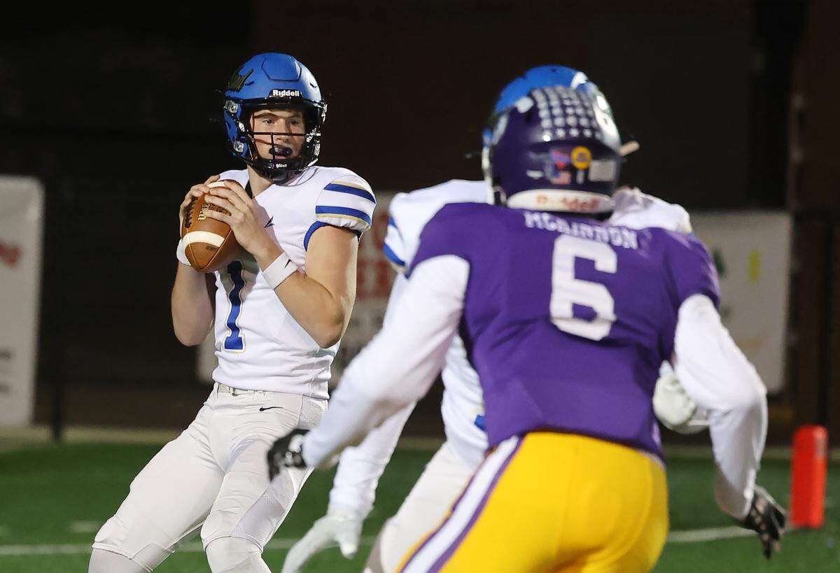 Indian Land quarterback Matt Kucia looks for an opening during a game on Friday, Oct. 31, 2025 in Rock Hill.