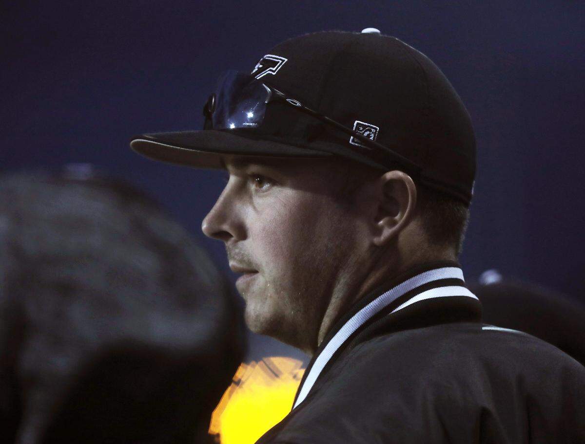 York Comprehensive baseball coach Tipper Crisson watches the Cougars play against Catawba Ridge in York.