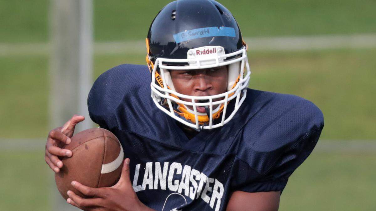 Lancaster High School varsity football player Bryce Surratt is one of three athletes competing for time at running back.