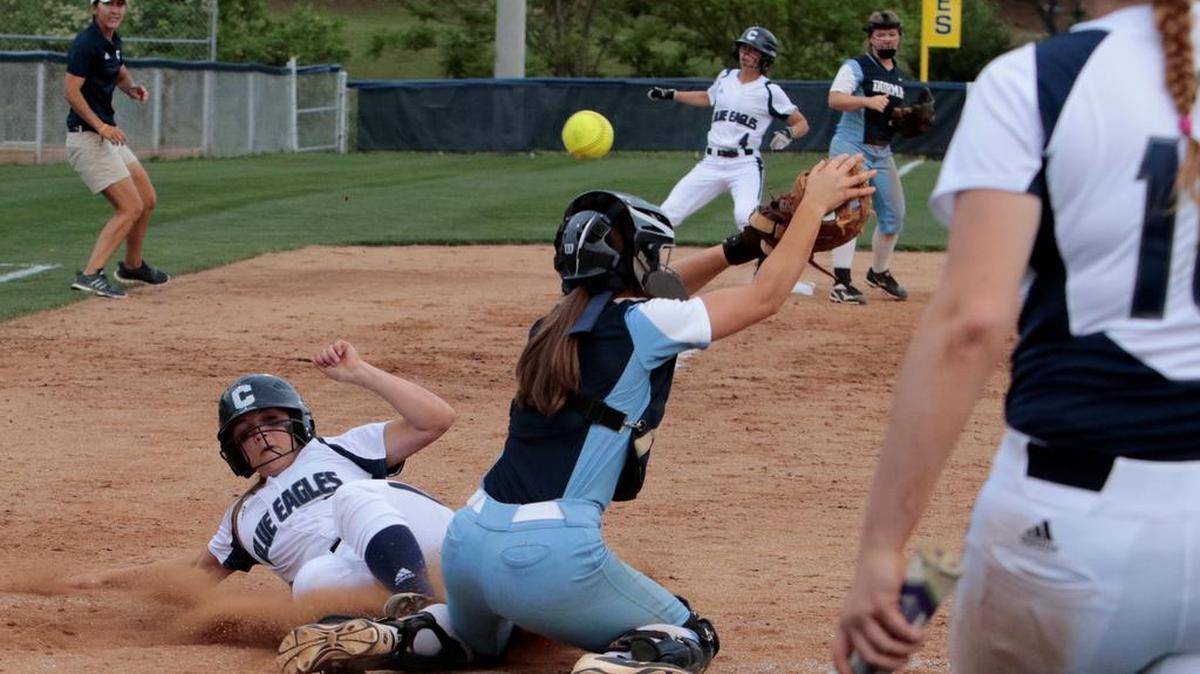 Clover’s Sophia Spronse slides safe into home plate as Clover hosts Dorman for the 5A district 4 softball championship Wednesday.