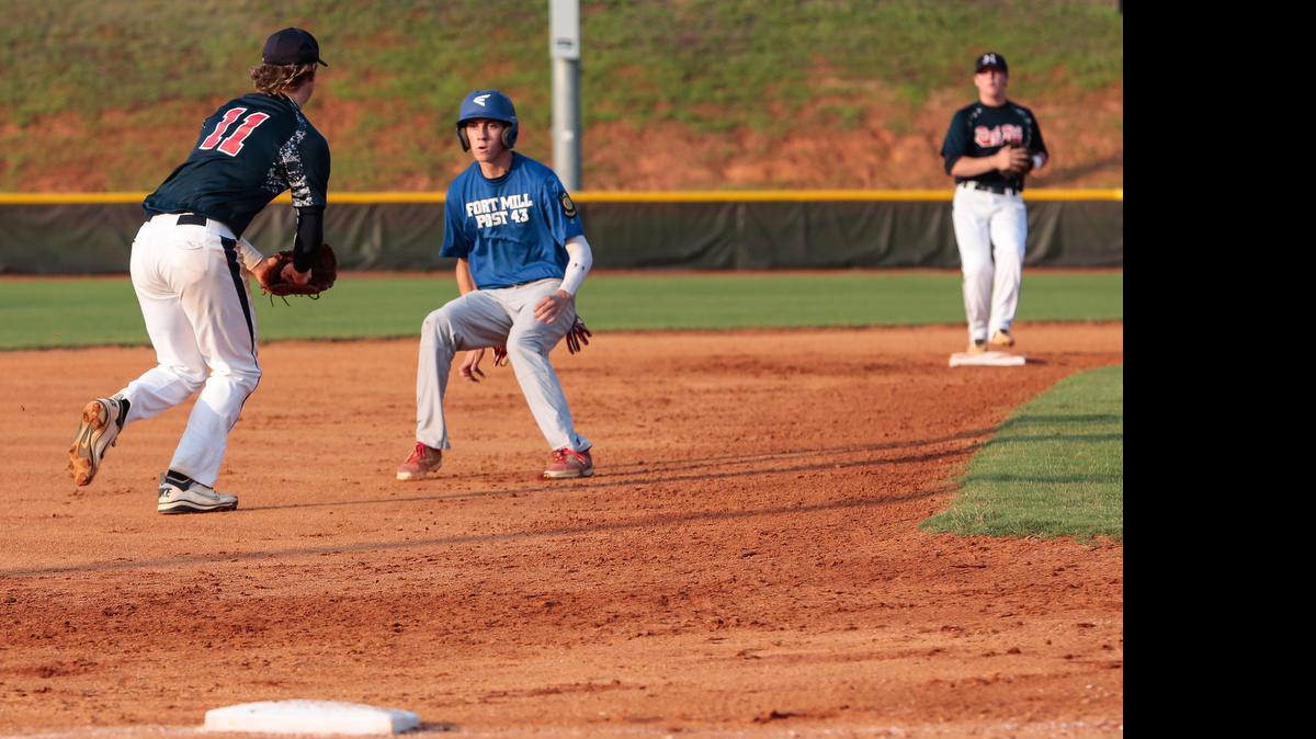 
Fort Mill's #10 Hunter Swanson gets caught between the bases by Rock Hill's #11 Will Reid as Rock Hill American Legion Post 34 faces off in a double header Monday evening against Fort Mill American Legion Post 43. 6-29-2015.
Rock Hill's pitcher #9 Cam Smith throws a strike as Rock Hill American Legion Post 34 faces off in a double header Monday evening against Fort Mill American Legion Post 43. 6-29-2015.


