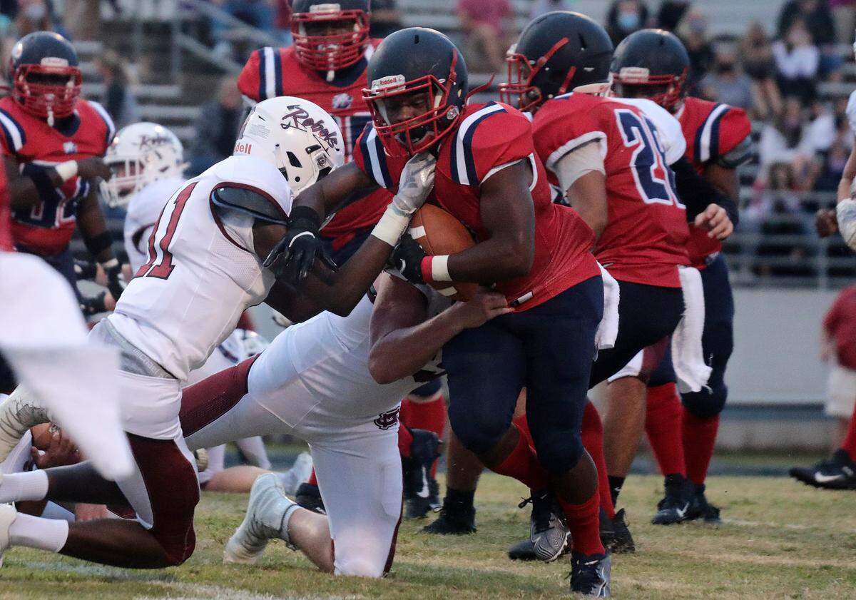 Chester’s Jaden Simmons carries the ball Friday as the Chester Cyclones take on the Mid-Way Rebels in Chester.