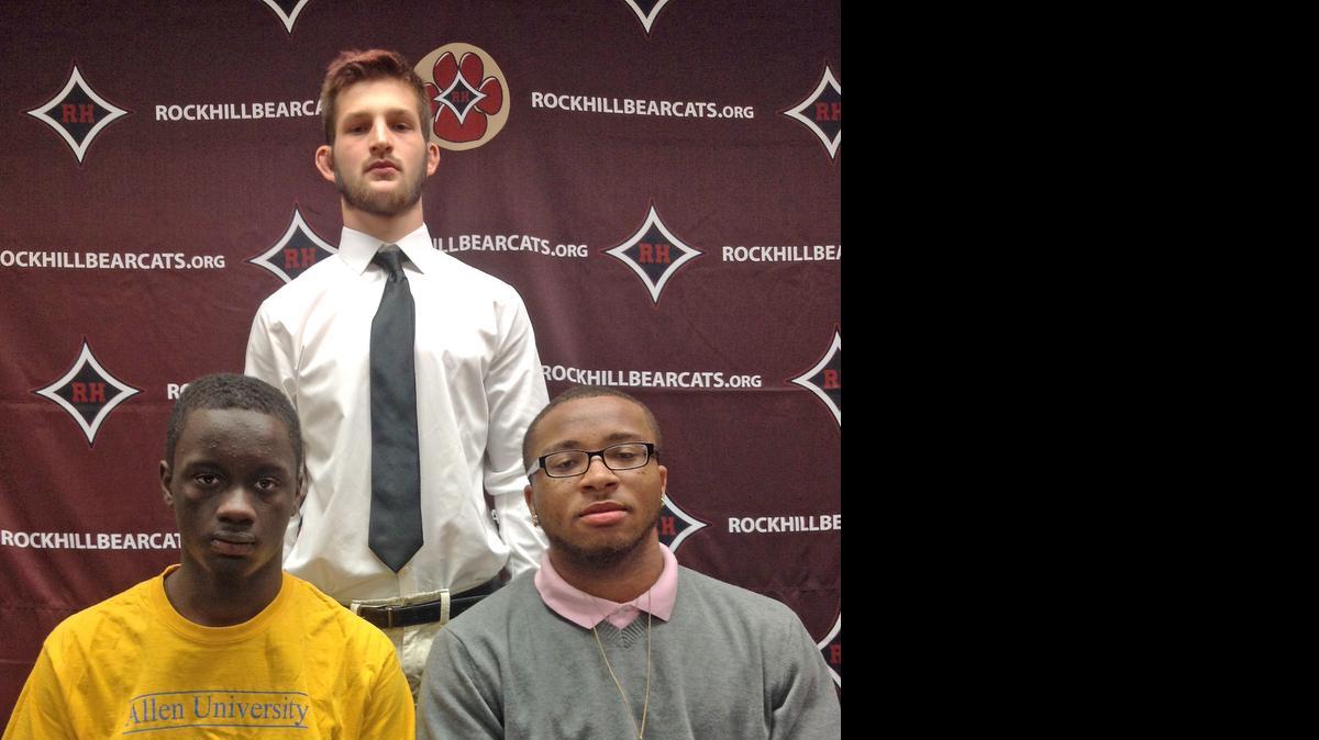
(Left to right) Rock Hill's Kendrick Mackey (wrestling, Allen College), Babe Rigby (wrestling, Allen College) and Emanuel Jones (Chabot College, football) signed NLIs on Wednesday morning at the school.
