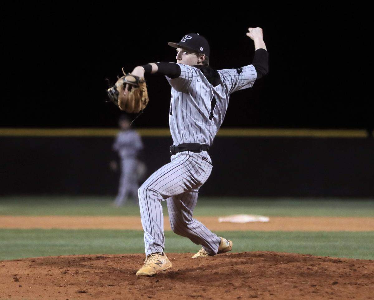 York Comprehensive’s Hunter Latham pitches Friday against the Catawba Ridge Copperheads in York.
