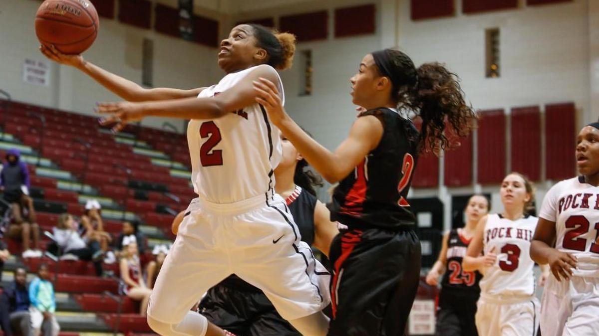 Rock Hill’s Brooklyn Bailey drives to the basket in Tuesday’s win. Bailey and Rikoya Anderson combined for 28 points to lead the Bearcats. .