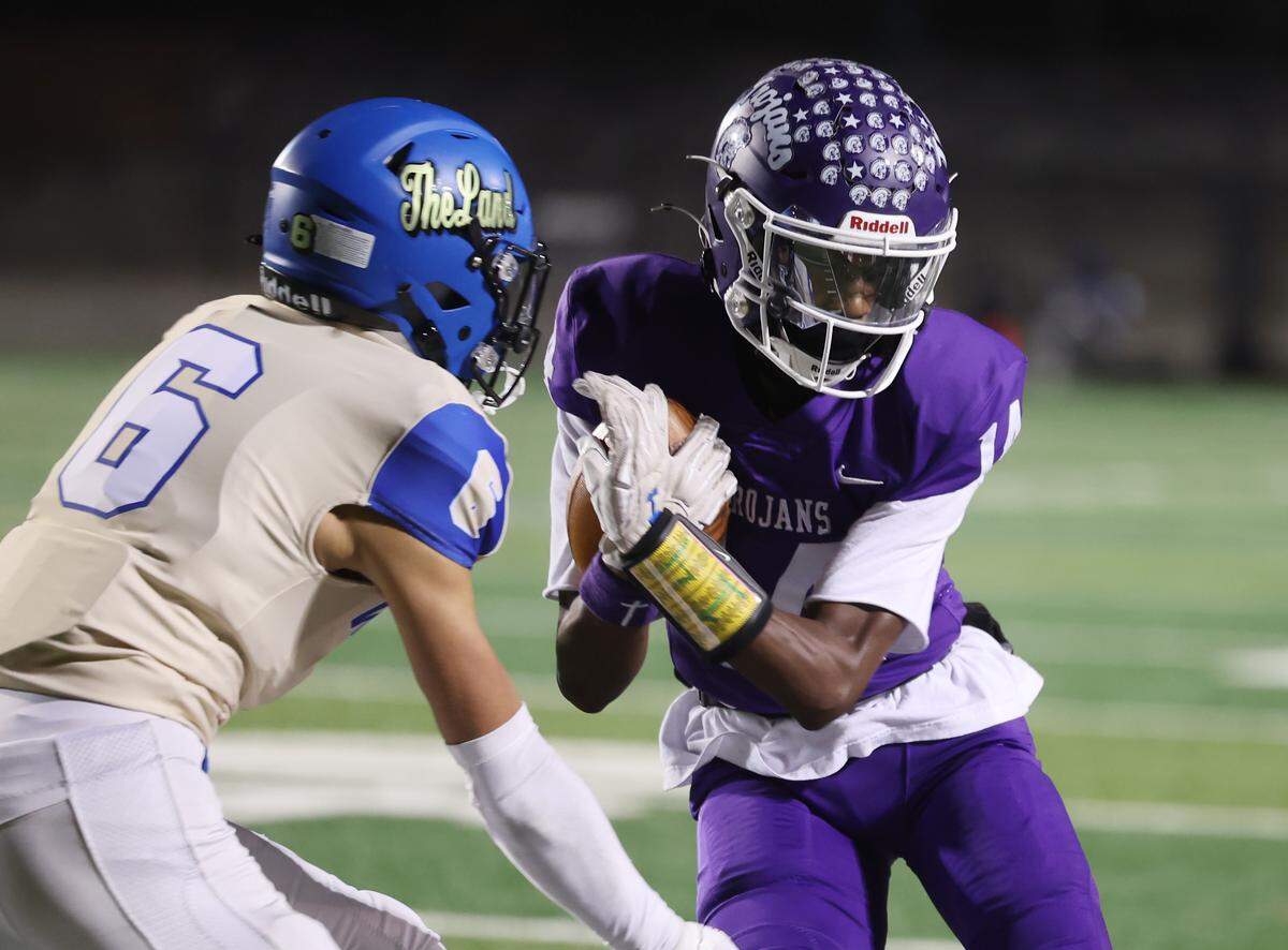Northwestern's David Flood carries the ball against Indian Land's Noah Terry on Friday, Nov. 28, 2025 in Rock Hill, South Carolina.