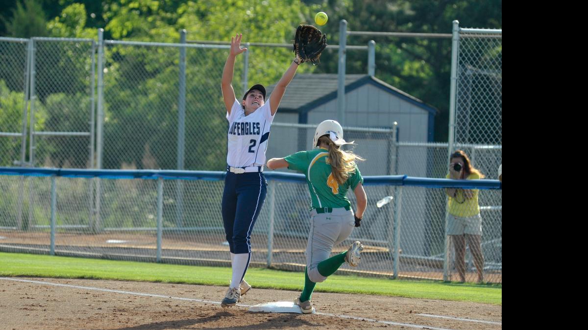 
Clover first baseman Hannah Curtis (2) stretches for the ball as Summerville’s Anna Gluhosky hustles up the line.
