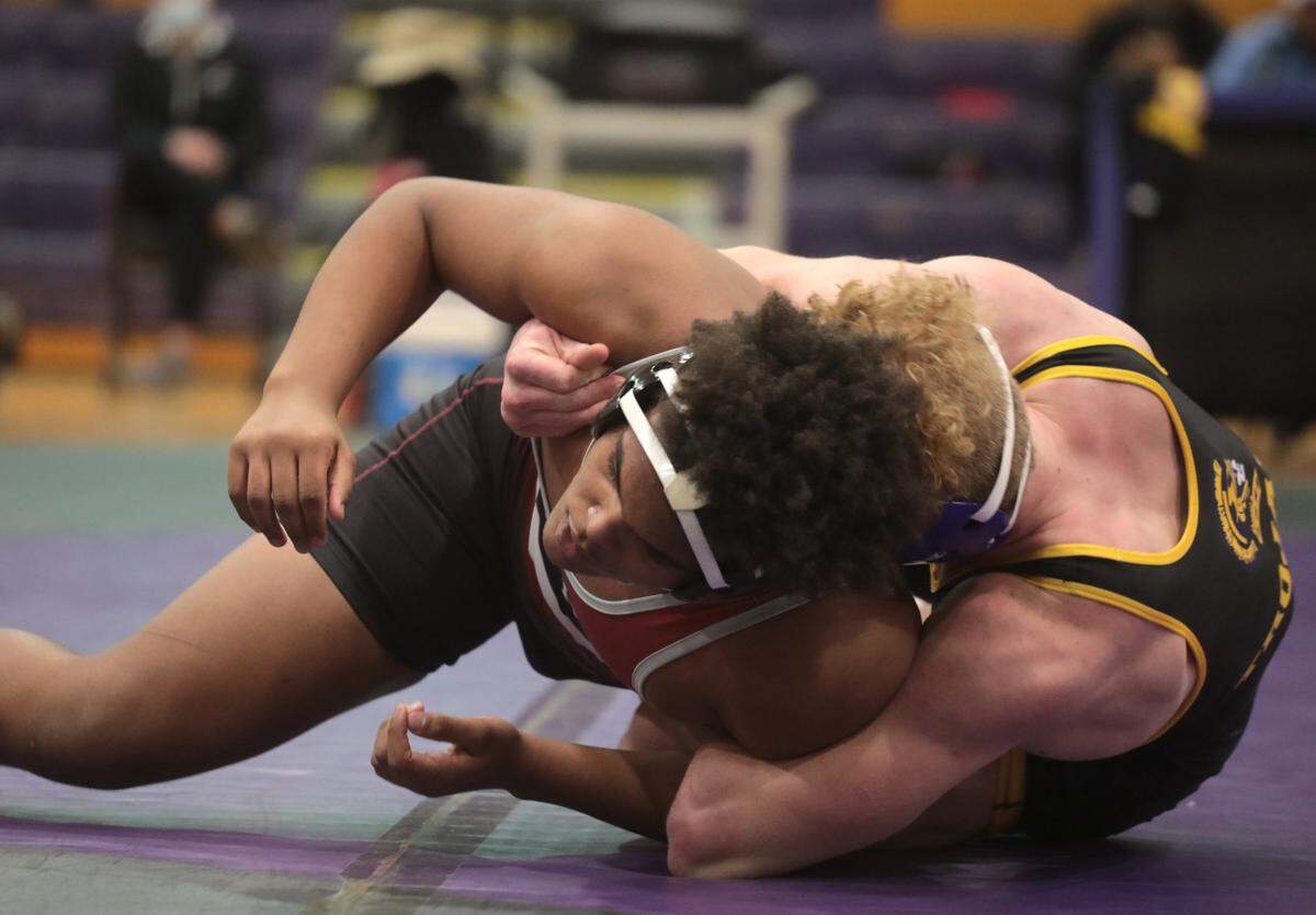 Rock Hill’s Waverly Brooks, left, and Northwestern’s Isaac McLellan compete Wednesday at Northwestern High School.