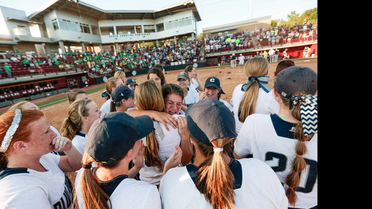 
Clover’s Taylor Stewart is overcome with emotion following the Blue Eagles’ 3-1 win in Game 3 to clinch the school’s first 4A softball state championship Friday, at Carolina Softball Stadium in Columbia. 

