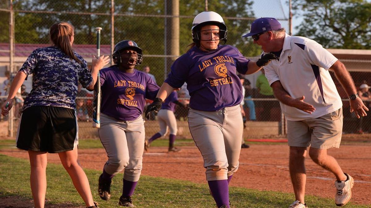 
Northwestern Trojans celebrate scoring a run against Boiling Springs during an elimination game in the 4A Upper State softball playoffs Wednesday in Boiling Springs.
