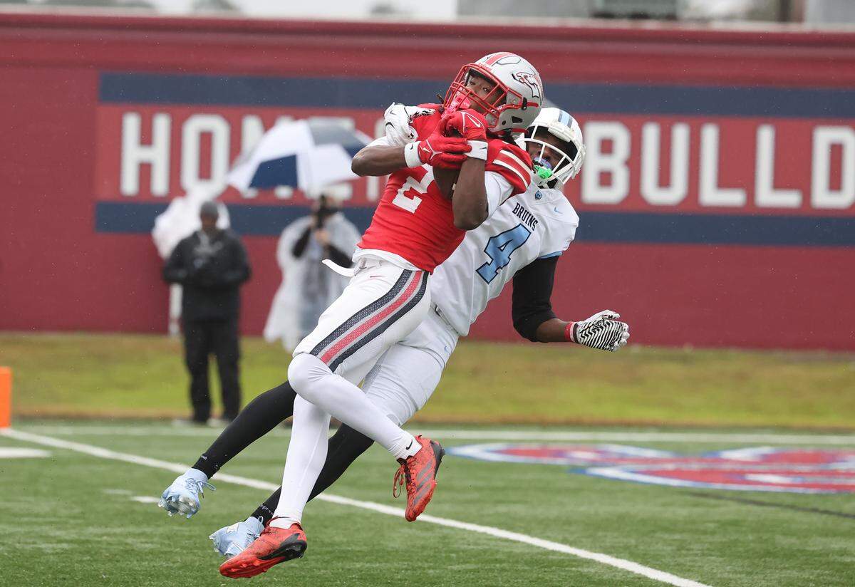 South Pointe's C.J. Wherry intercepts the ball in the end zone against Malik Robinson Saturday at the SC High School League Class 4A football championship in Orangeburg, S.C.