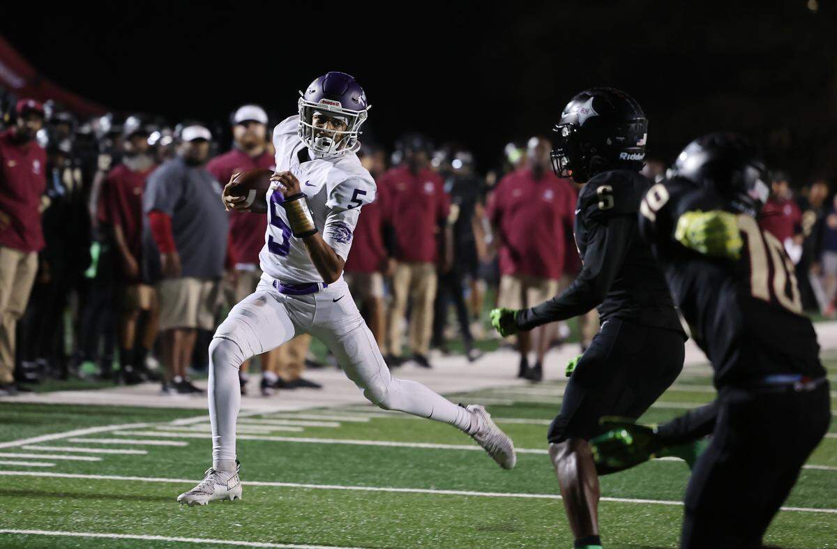Northwestern's Xavier Means heads to the end zone during an October game.