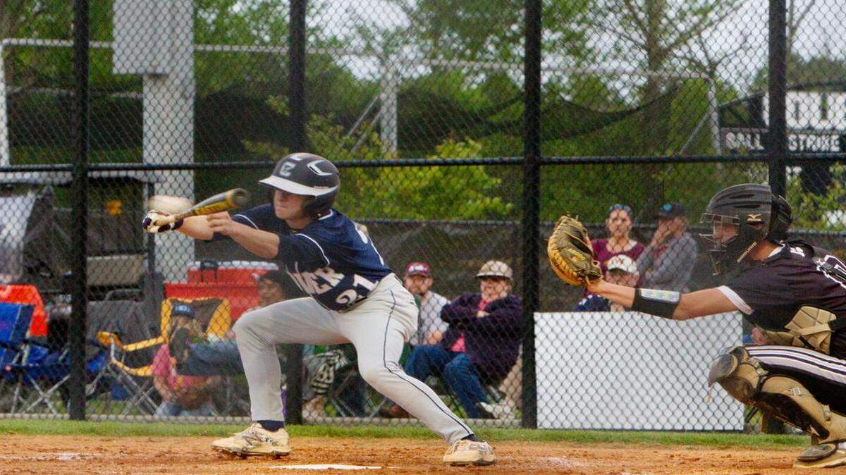 
Garrett Goldberg lays down a bunt for Clover. The Blue Eagles beat York, 3-1, on Friday.
