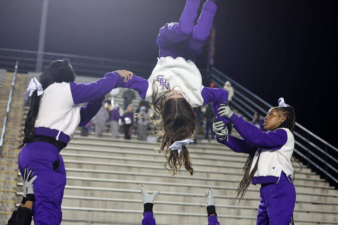 Northwestern cheerleaders perform a stunt Friday at a school playoff game in Rock Hill, S.C.
