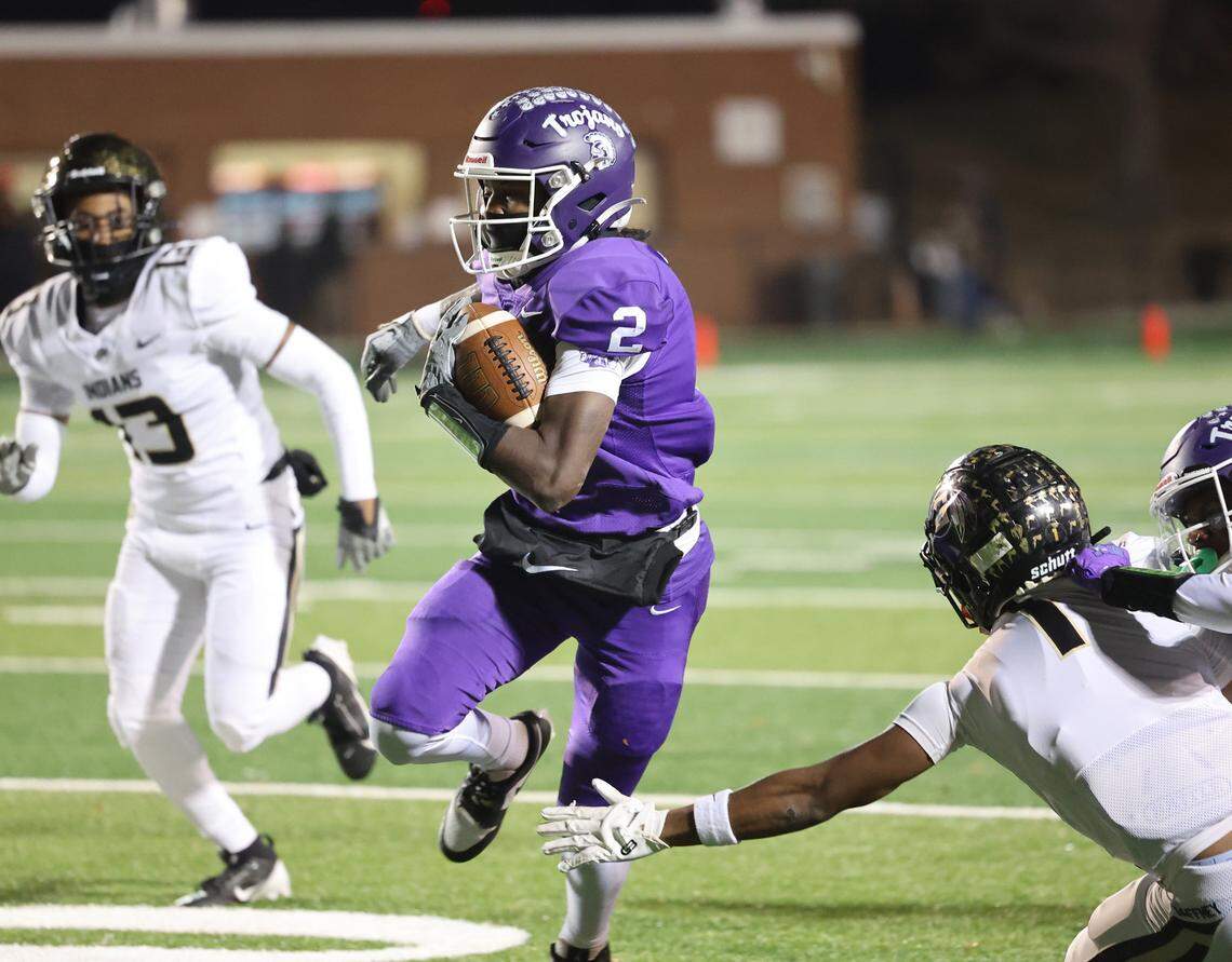 Northwestern’s Jayden Nichols carries the ball Friday in Rock Hill as the Trojans face the Gaffney Indians.