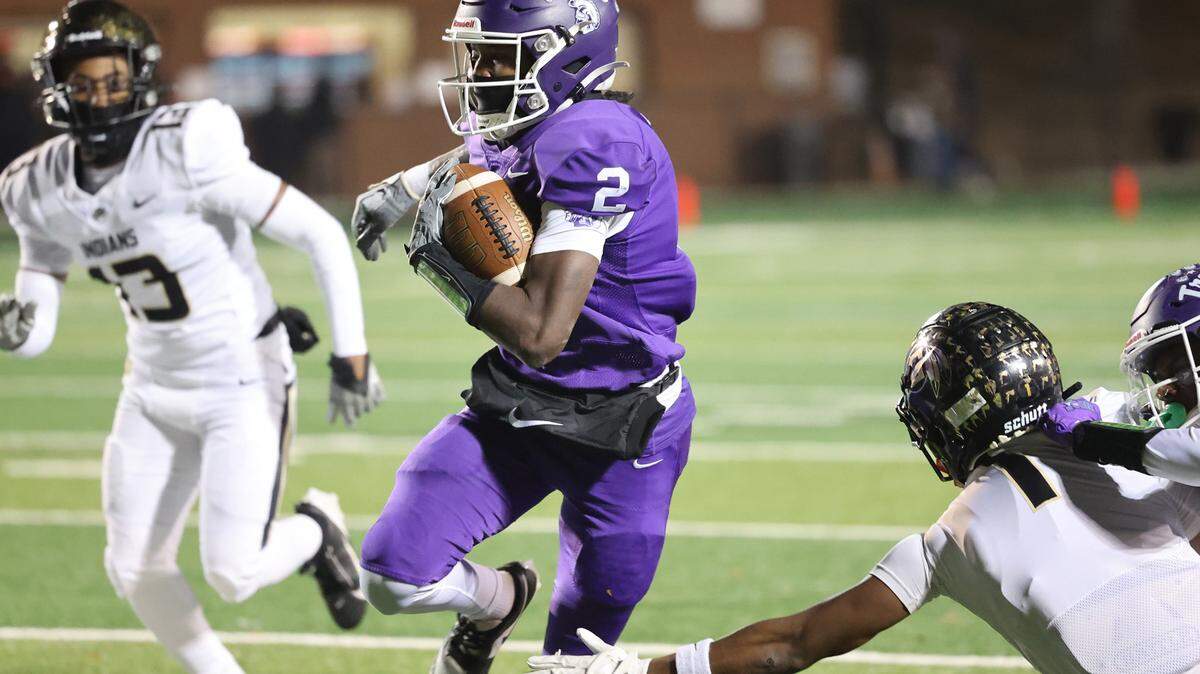 Northwestern’s Jayden Nichols carries the ball Friday in Rock Hill as the Trojans face the Gaffney Indians.