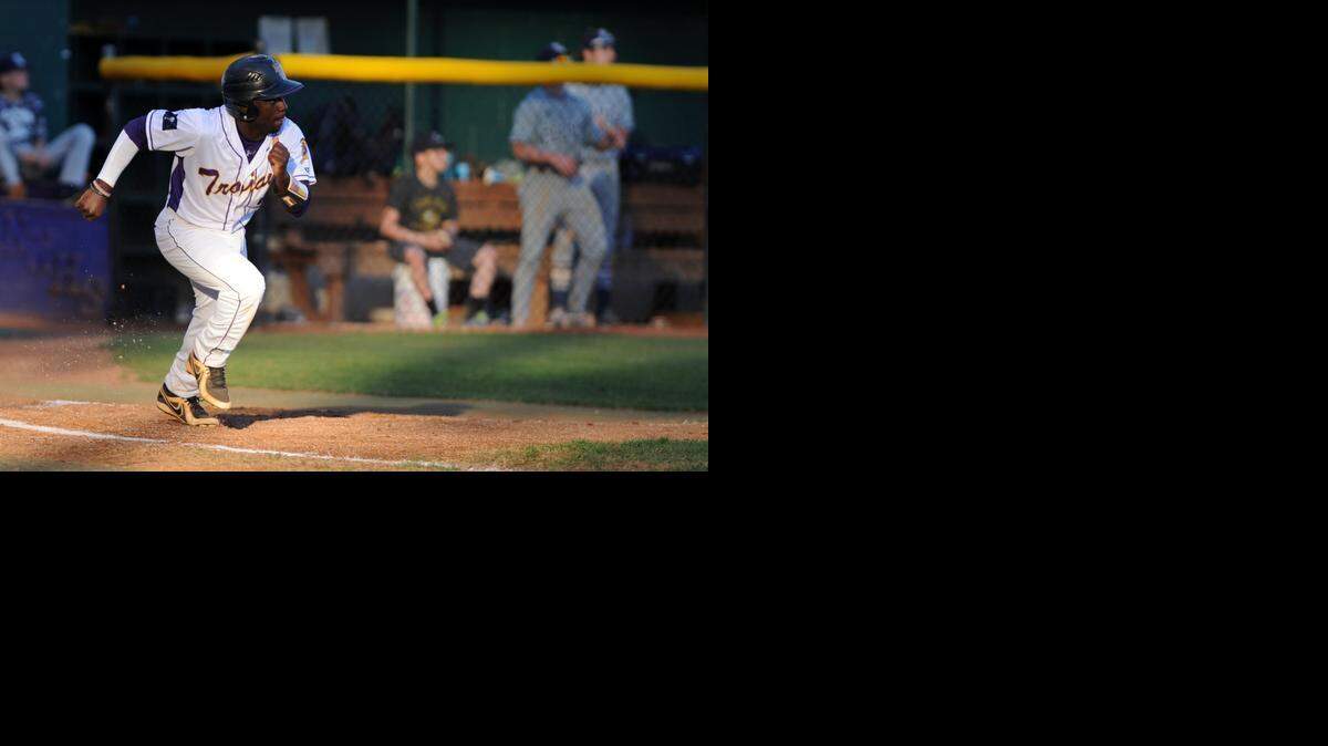 Dupree Hart runs to first base after getting a hit at bat against Clover.