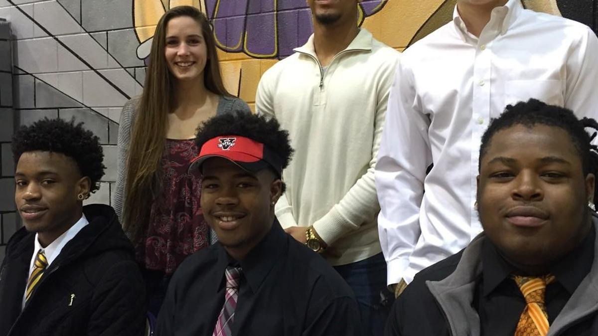 The first signing ceremony of the day took place at Northwestern. (Clockwise from top left) Haley Blythe, Alex Anderson, Loughan Welborn, Jamah Mitchell, Trae’von Hinton and Davion Blake will all play college sports.