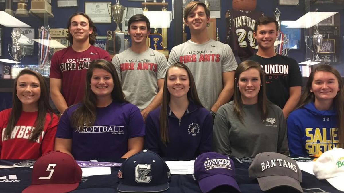 It was a busy afternoon at Clover High School Monday with nine athletes signing national letters of intent to play college sports. (Back to front, left to right) Kyle Kalick (USC Sumter), Cole Hybarger (USC Sumter), Kaleb Strader (USC Sumter), and Graham Whitesides (USC Union); Kailey Carpenter (Newberry), Taylor Stewart (Converse), Taylor Morneault (Converse), Katie Robinson (Lees-McRae), and Kayla Ogle (Salem) all signed Monday.
