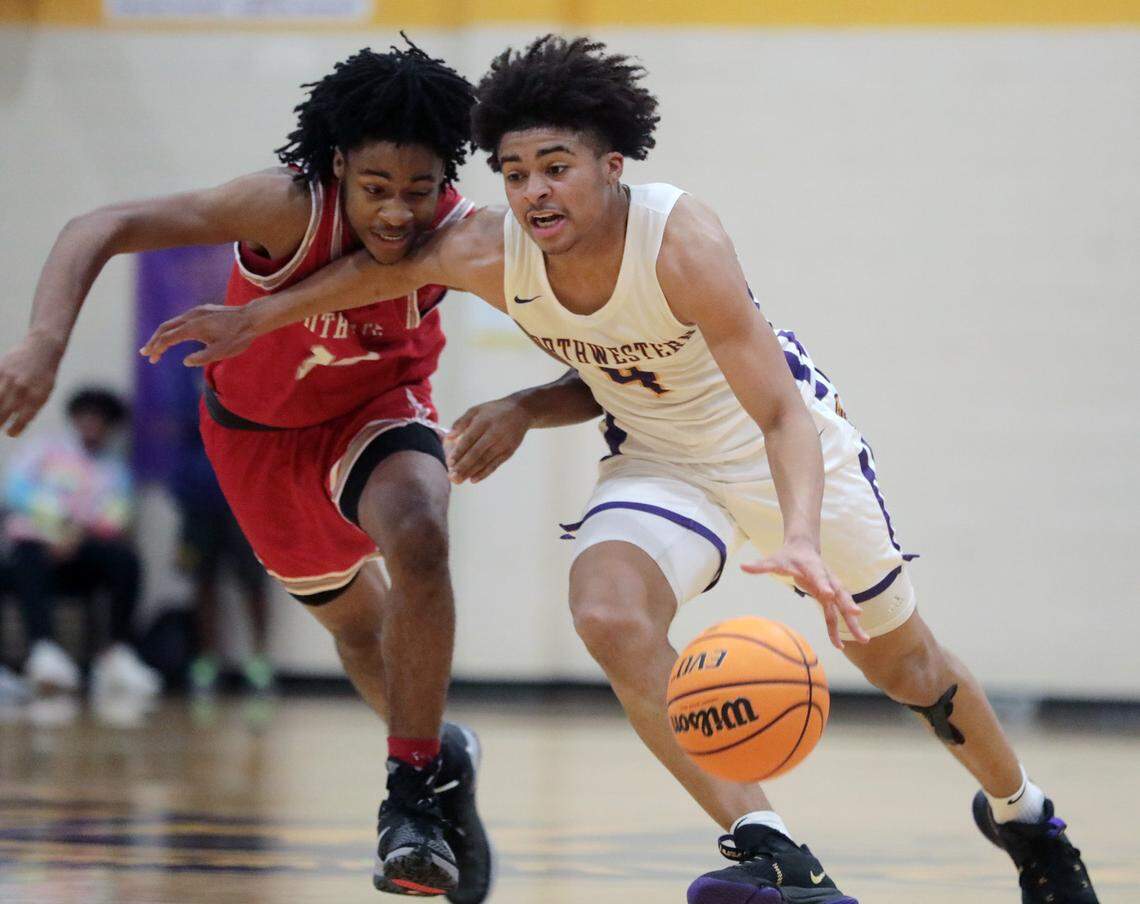 Northwestern’s Jalen Burnett heads to the basket against South Pointe’s Corinthian Finch.