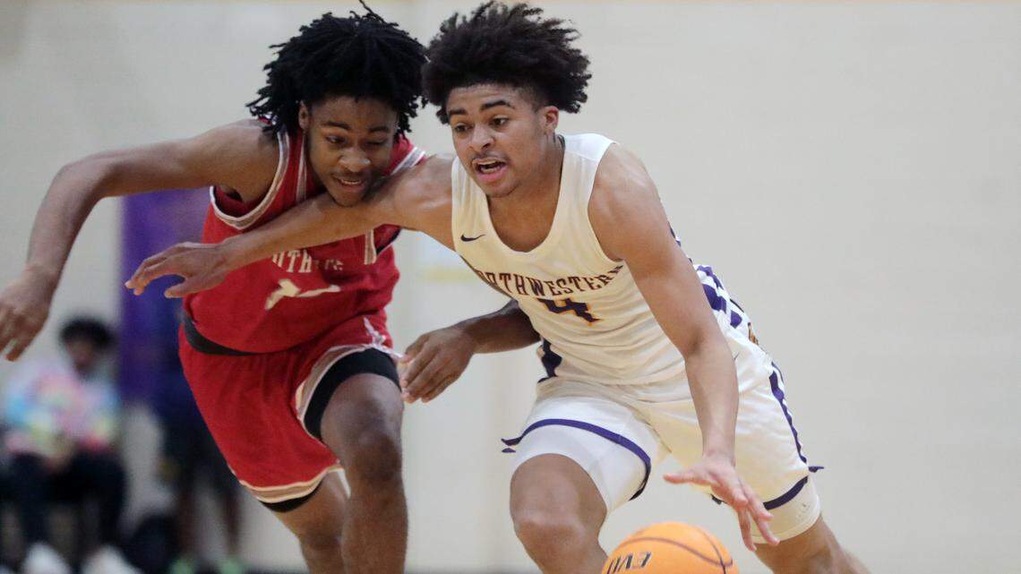 Northwestern’s Jalen Burnett heads to the basket against South Pointe’s Corinthian Finch.