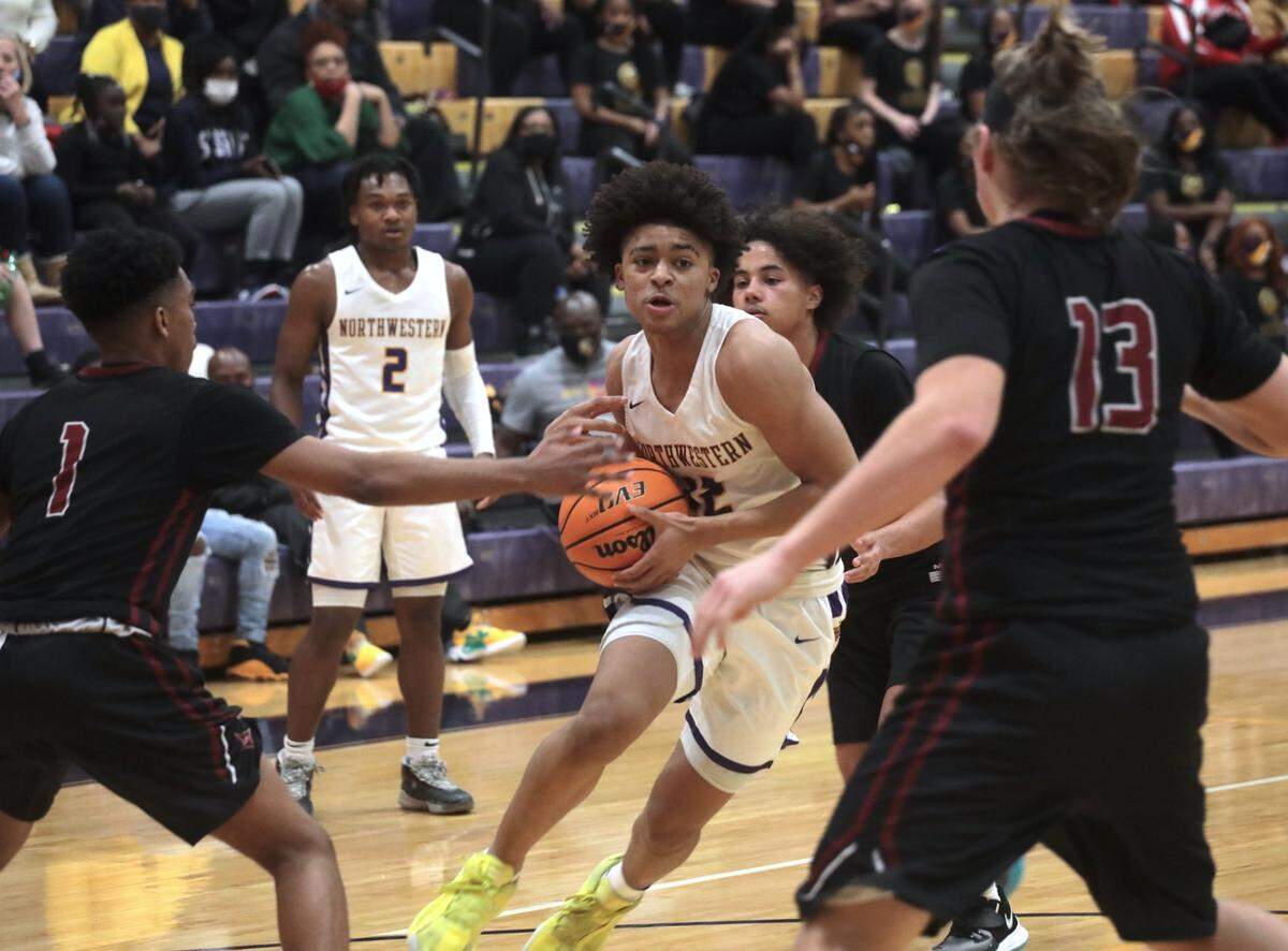 Northwestern’s Jalen Burnett heads to the basket as the Trojans take on the Rock Hill Bearcats in an important region game in the 2021-22 season. Burnett will be a key piece in the 2022 season.
