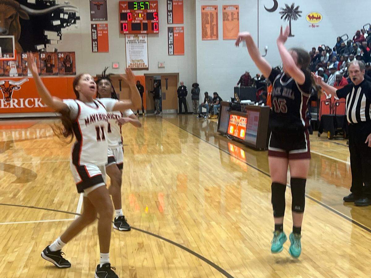 Rock Hill sophomore Chloe Hudson rises up for a three in the first quarter of Rock Hill’s 51-33 win over Mauldin in the quarterfinals of the SCHSL 5A Girls Basketball State Tournament. Photo by Michael Burgess II