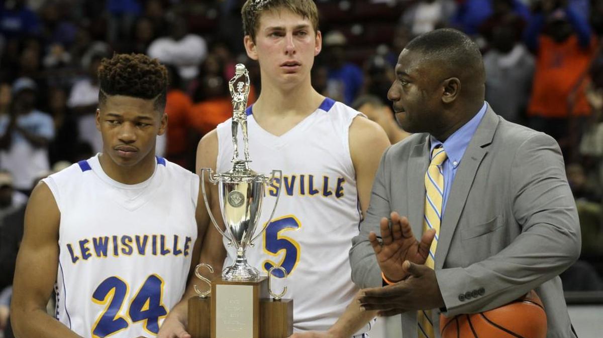 Lewisville coach Mike McCray, right, claps for Mike Hill, left, and Trey Keels on Friday after the team lost the state championship game in Columbia.