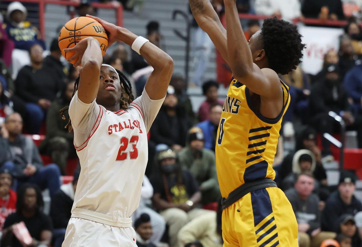 South Pointe’s R.J. Hill shoots the ball against Lancaster’s Jordan Watford Tuesday in Rock Hill, S.C.