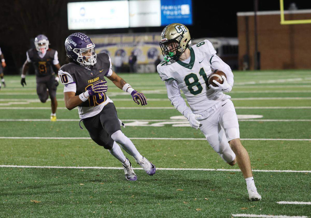 Catawba Ridge High School's Colten McCauley (81) tries to outrun Northwestern HIgh School's Jayden Baxter Friday, Nov. 14, 2025 in Rock Hill, S.C.