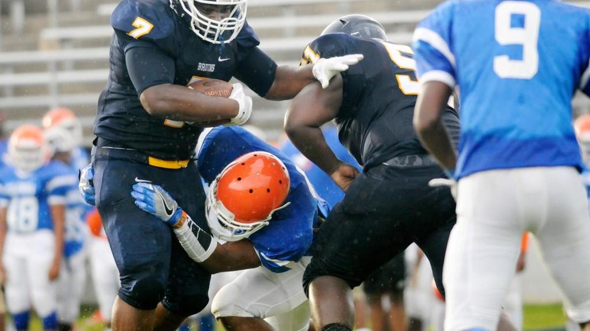 Lancaster's Kemarkio Cloud carries the ball in the Chester jamboree.