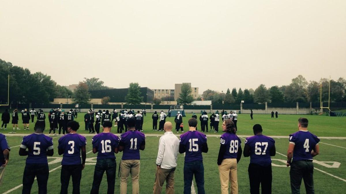 Northwestern Trojans players and coaches took in the Panthers’ walk-through on Sunday morning in downtown Charlotte.