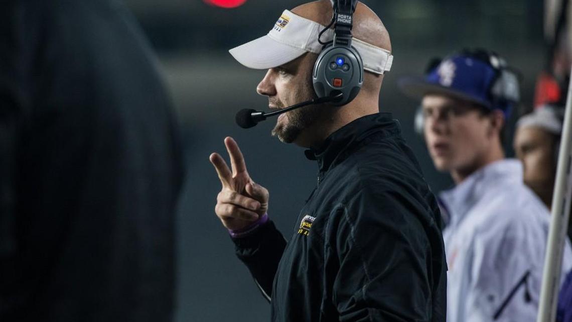 Northwestern head coach Kyle Richardson communicates with his team during Saturday's Class 4A, Division II championship at Williams Brice Stadium.