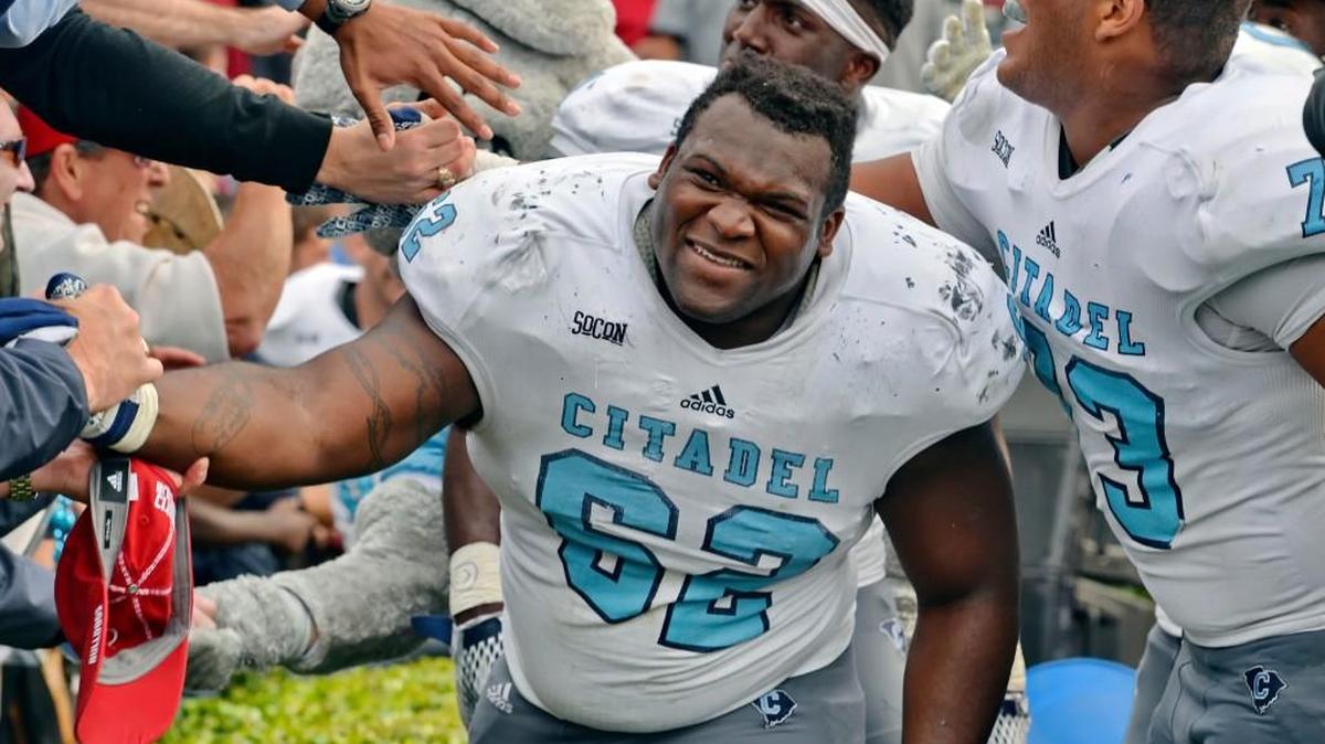 Citadel’s Mitchell Jeter celebrates with the fans after of an NCAA college football game against South Carolina on Nov. 21 in Columbia, S.C. Citadel won 23-22.