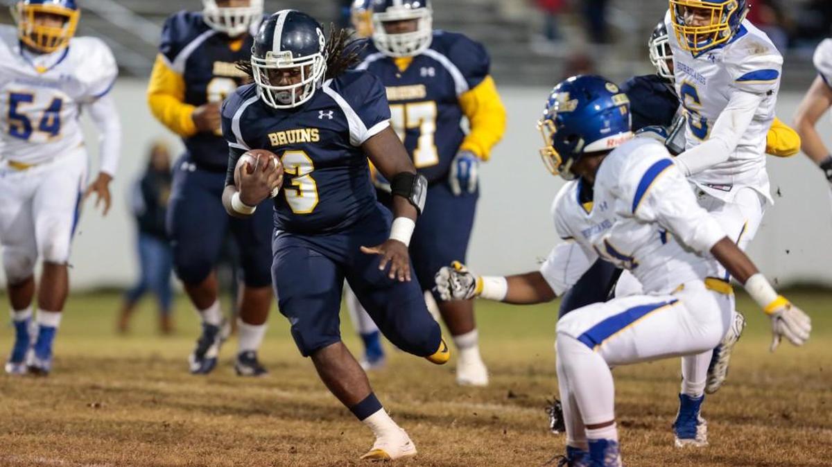 Lancaster's #3 Ant Fosterbreaks out a long run as Lancaster hosts Wren in first round of the 3A football playoffs, 11-13-2015.