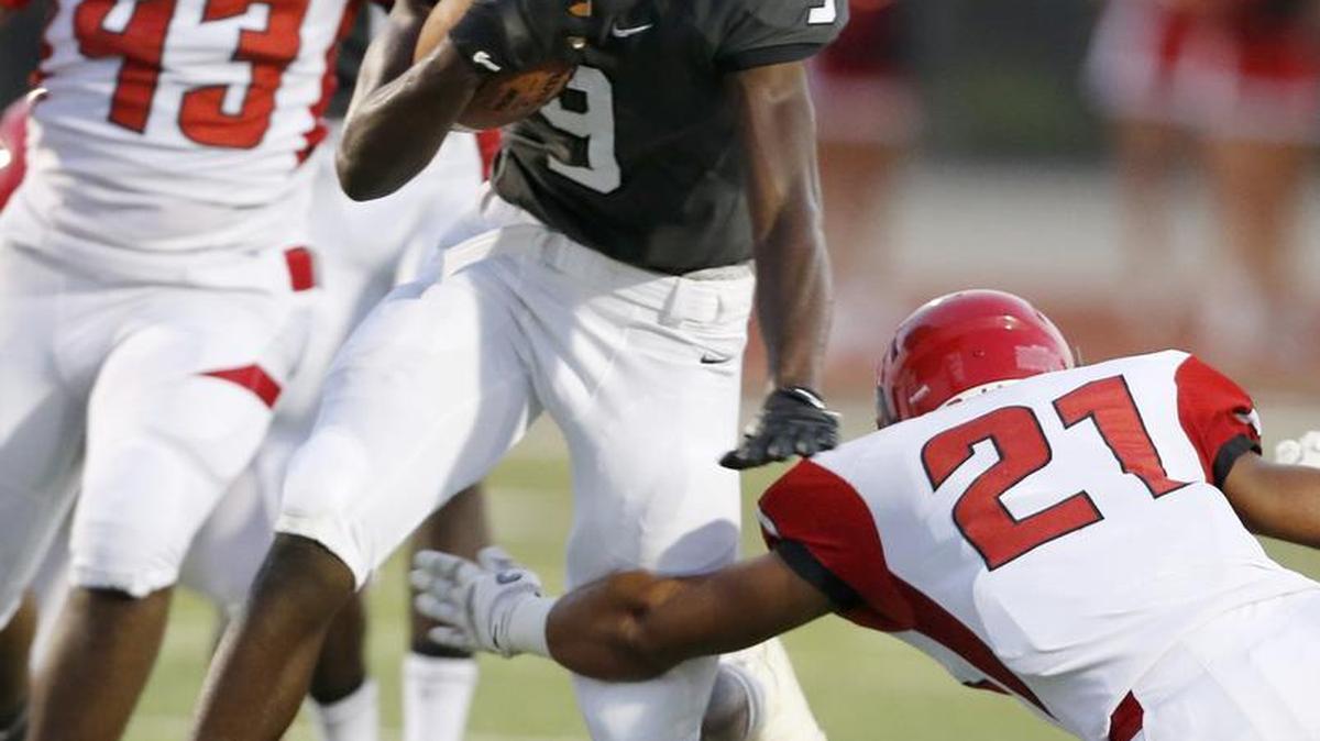 York hosted Nation Ford September 9, 2016. York's Ladarius Allison picks up a first down before he is taken down by Nation Ford's Jordan Gaines in the first quarter.