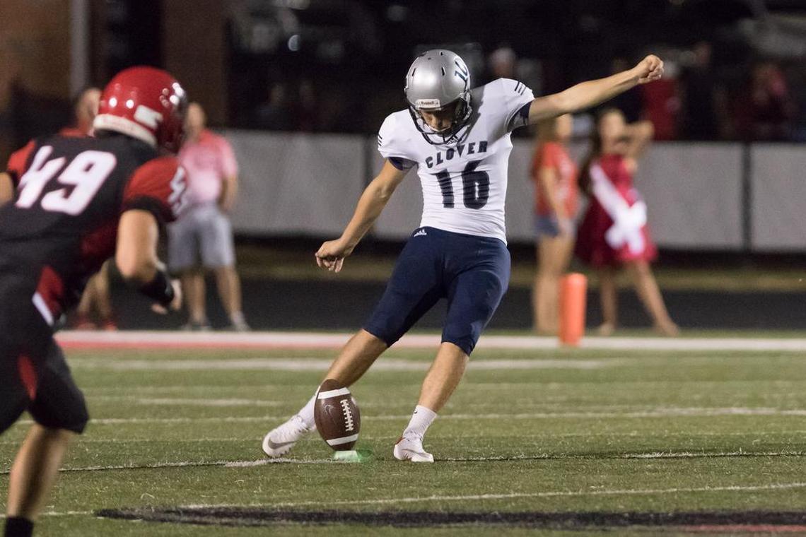 Clover’s Nick Sciba (16) kicks off.
