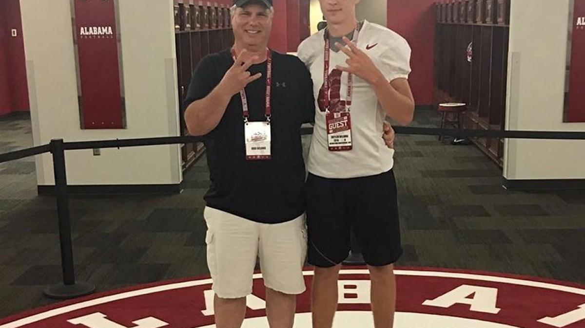 Skyler DeLong and his dad, Bob, at the Alabama kicking camp in early June.