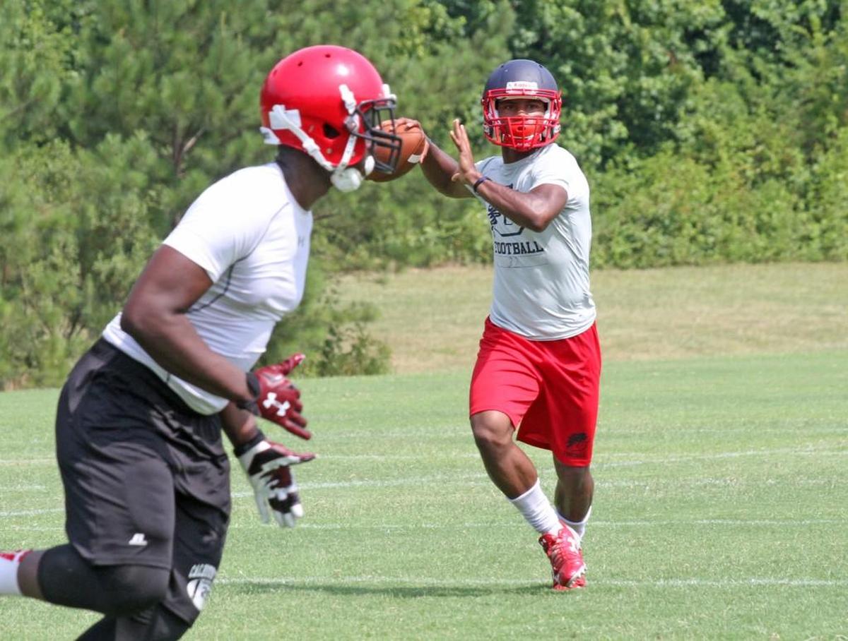 Malik Williams prepares to throw to his receiver at a Chester football practice. Williams, now a senior receiver at Appalachian State, will travel to Chapel Hill with his team to take on UNC on Saturday.