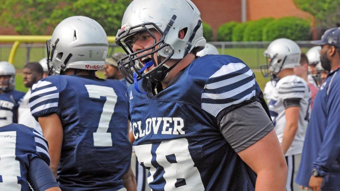 Center Garrett Lutz leads a large Clover offensive line that’s adjusting to a new blocking scheme in coach Brian Lane’s spread offense.