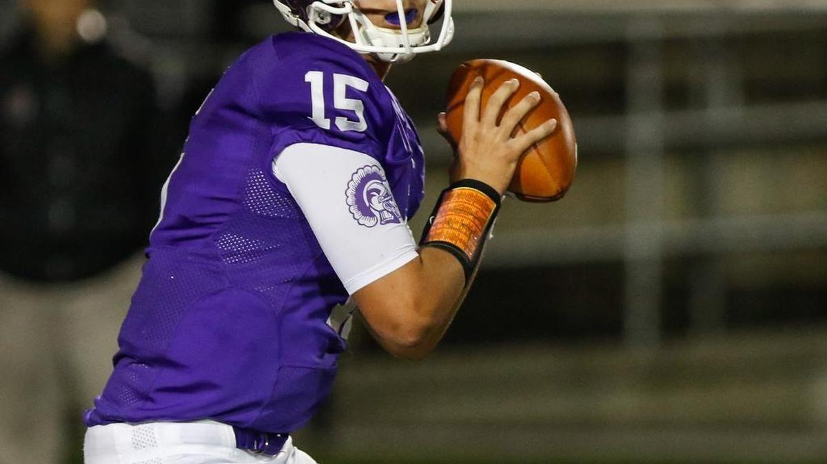 Northwestern quarterback Gage Moloney drops back for the pass as Northwestern hosts South Mecklenburg at District 3 Stadium Friday, 9-2-2016.