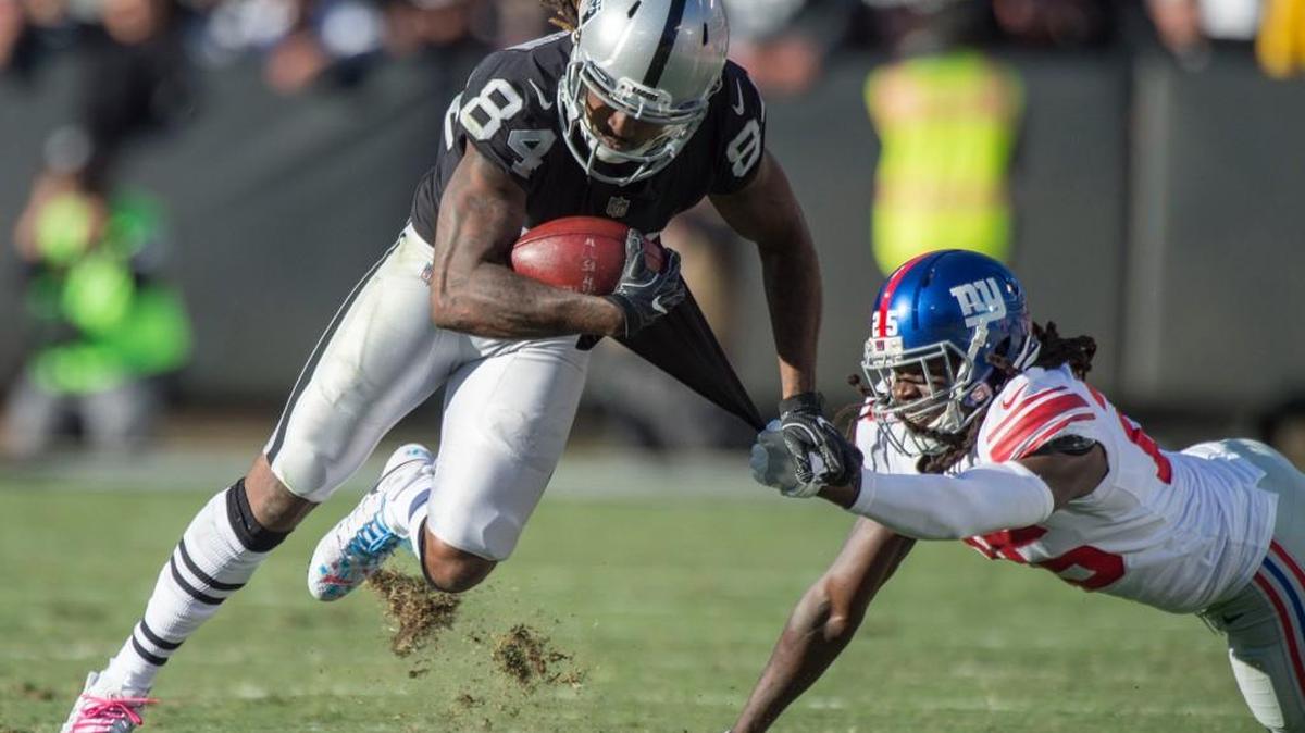 Oakland Raiders wide receiver Cordarrelle Patterson (84) gets away from New York Giants corner Brandon Dixon (25) on Sunday, Dec. 3, 2017 at the Oakland-Alameda County Coliseum in Oakland, Calif. It was the second week in a row that a big play from Patterson late in the game clinched a Raiders win.