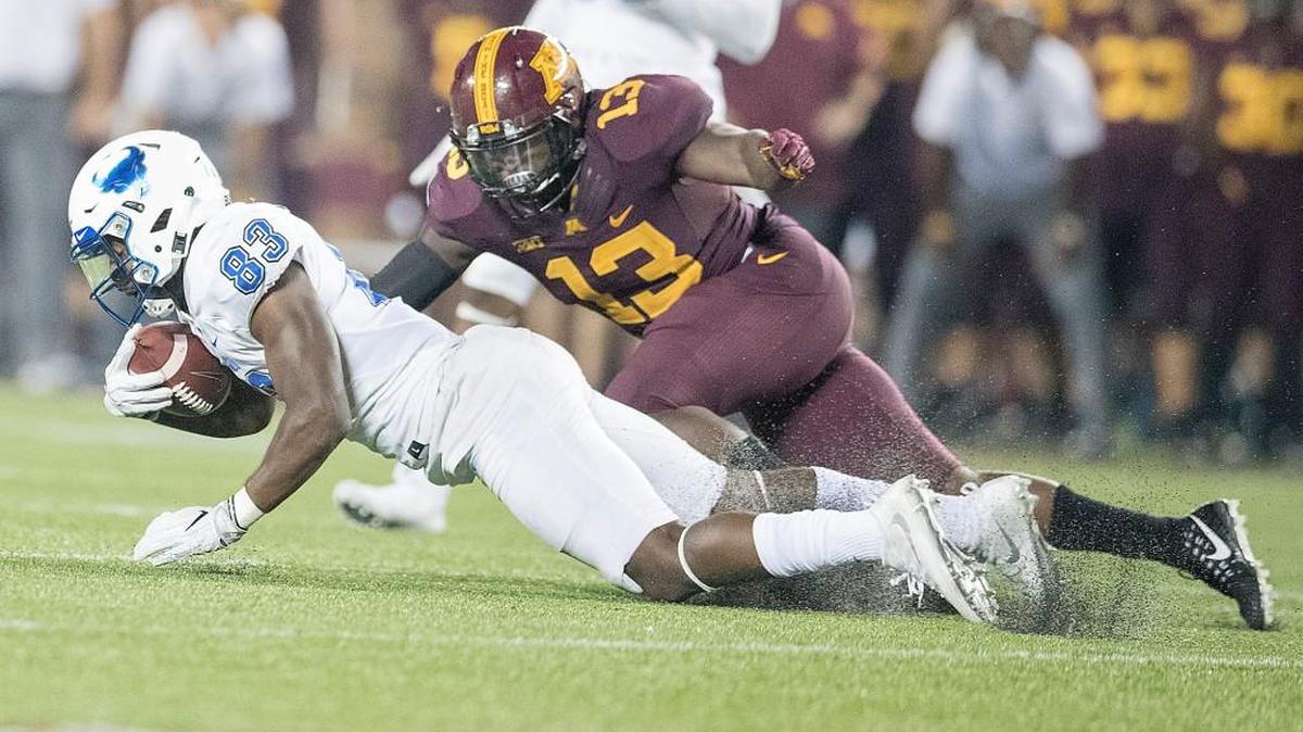 Minnesota linebacker Jonathan Celestin (13) stops Buffalo wide receiver Anthony Johnson (83) during the fourth quarter at TCF Bank Stadium in Minneapolis on Thursday, Aug. 31, 2017. The host Golden Gophers won, 17-7.